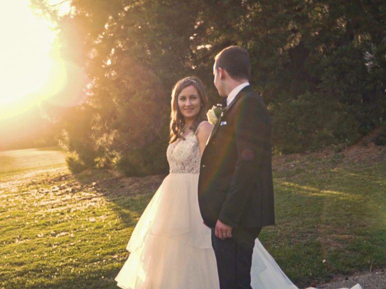 Bride and grooom in the sun